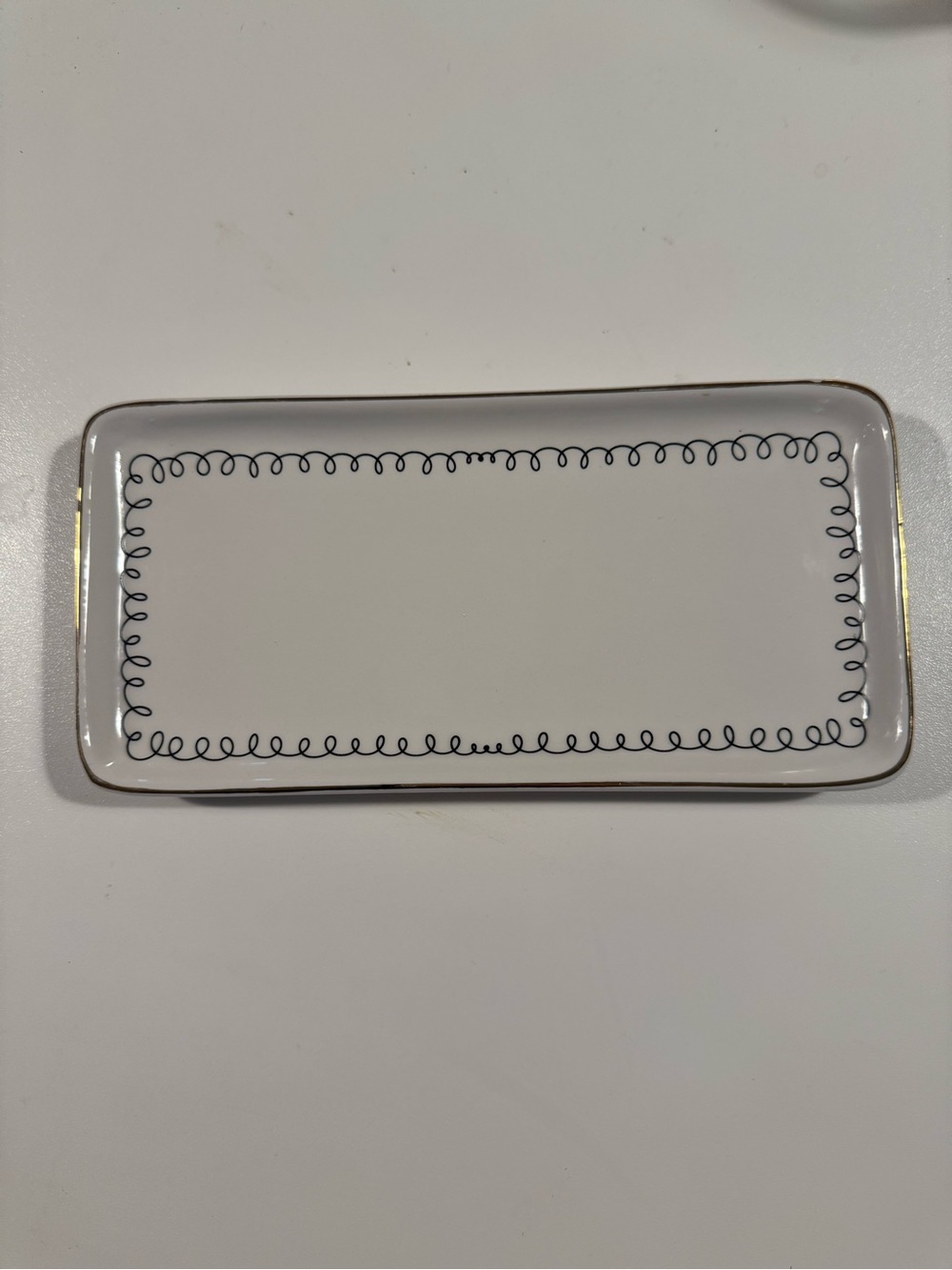 White Ceramic Trinket Tray with Black Swirl Border